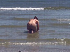 Kaytti Peaches crawling in the shallows in her microbikini 01 gif