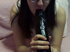 sluty nerdy gril in glasses suck big  dildo gif