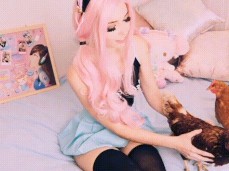 Belle Delphine strokes two BIG cocks gif