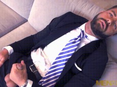 Handsome man in suit jacks off, looking into  0704 5 gif