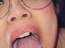 Asian Slut swallows a load of White Cum gif