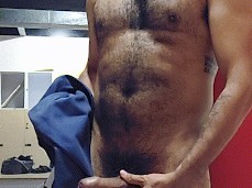 handsome, bearded Zorro jerks his uncut cock in the lockerroom 0447-1 7 gif