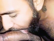 handsome, bearded ElZorroBarbon licks a guy's uncut cock 0049-1 3 gif