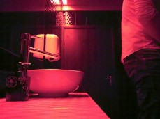 Club bathroom blowjob gif