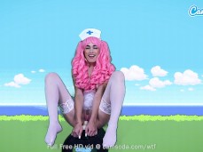 Sexy nurse Delilah Day sits in her  show on sybian gif