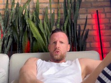 Tim Kruger strokes his huge uncut cock, cums on football socks 0400-1 5 gif