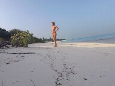 Sexy Girl takes Nude Beach Walk gif