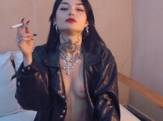 Tatted Girl Smokes Cigaratte gif