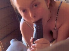 Super cute blonde girl feasting on a black cock gif