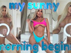 MILF in a sheer top and miniskirt gif